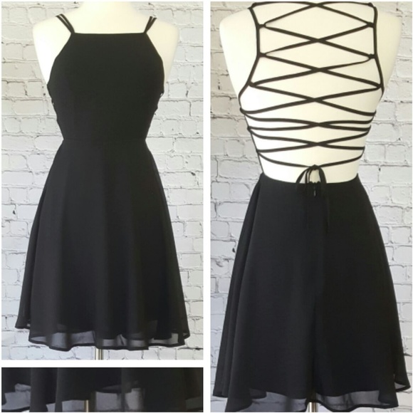 Black Sleeveless Dress With Criss-Cross Back - Picture 2 of 2